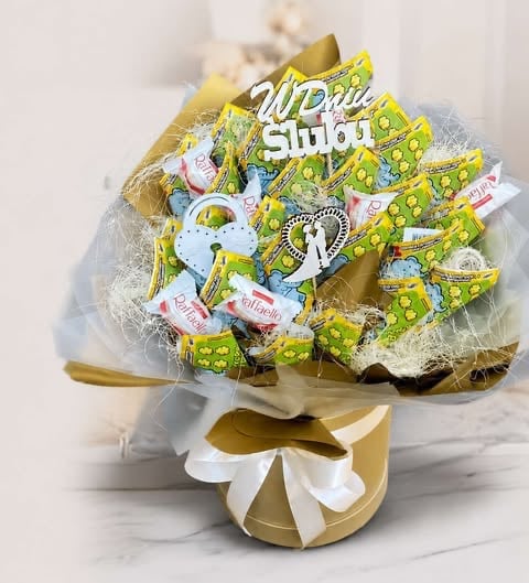 Merry Smiles candy bouquet with lime green wrapped chocolates and white bow in gold vase